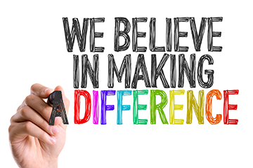 We believe in making a difference written in marker